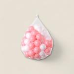 Set of soft plastic balls in pastel storage bag with hanging loop